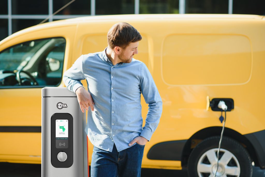 Home vs. Public Charging Stations: What’s Best in 2025? 2 man charging his electric car charge station